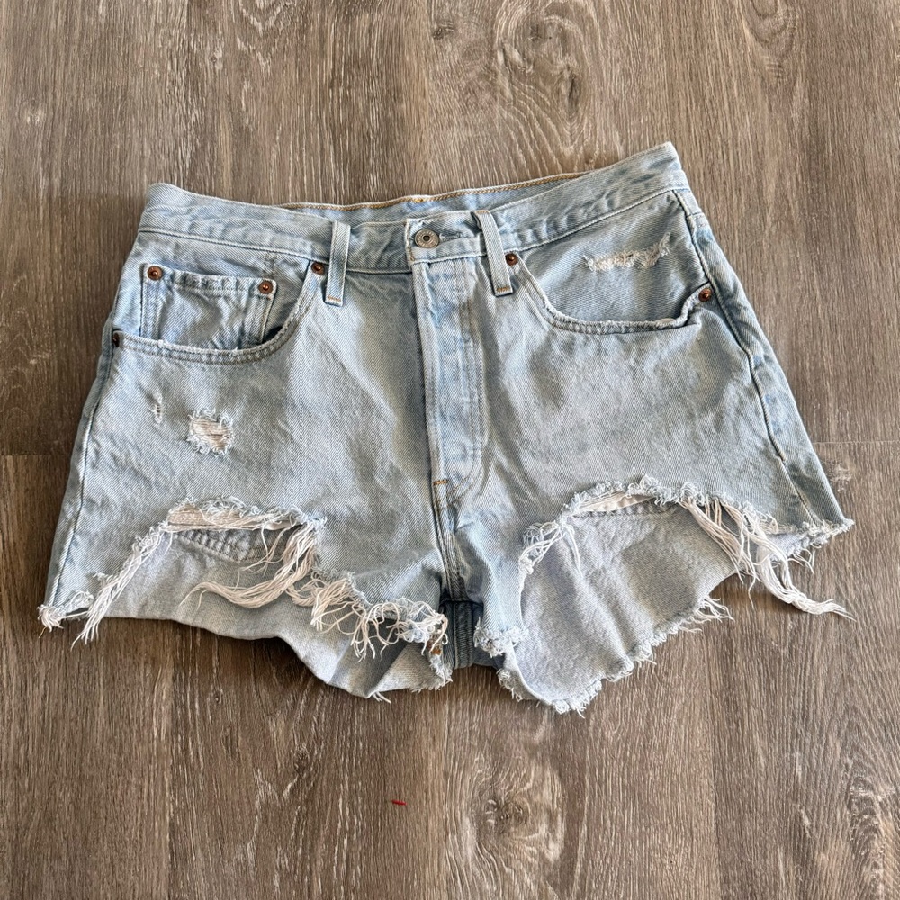 LEVI’S 501 Distressed Light Blue Denim Shorts